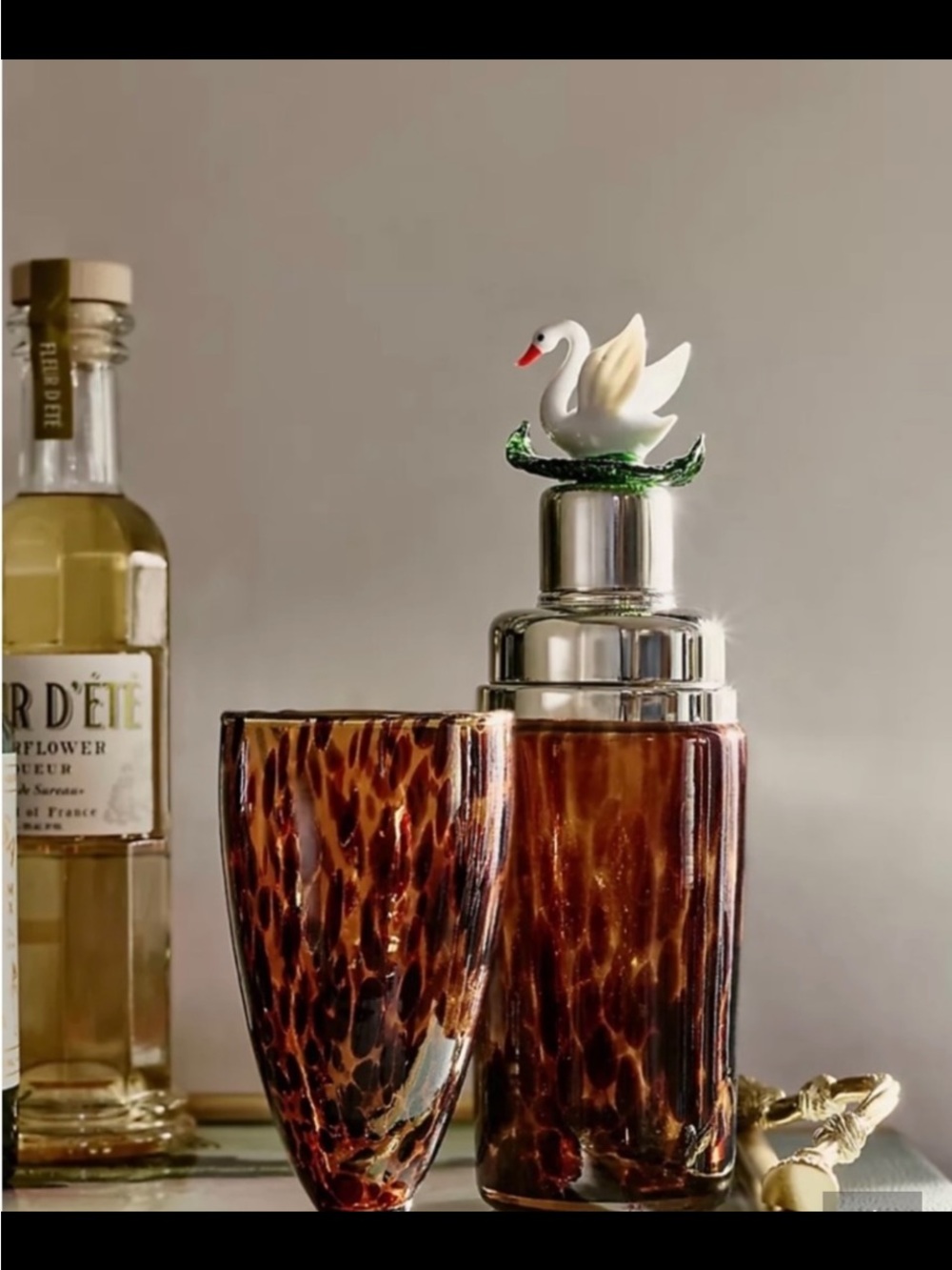 Anthropologie Tortoiseshell Glass Cocktail Shaker with Swan Topper.